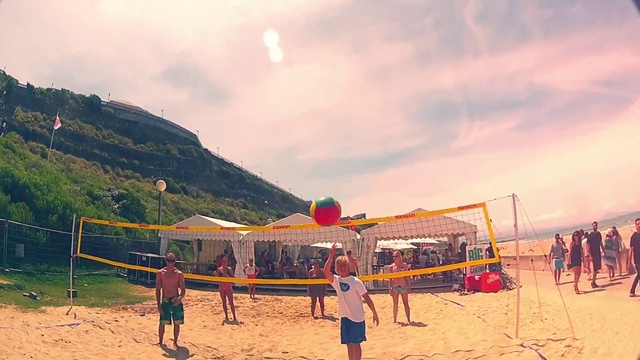 Video Reference: Volleyball net, Volleyball, Beach volleyball, Net sports, Sky, Team sport, Beach, Summer, Cloud, Leisure, Person
