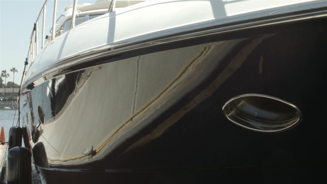Video Reference: boat, vehicle, motor vehicle, yacht, watercraft, water transportation, picnic boat, automotive exterior, luxury yacht, ship