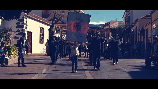 Video Reference: Sky, People, Street, Pedestrian, Town, Snapshot, Urban area, Human, Infrastructure, Tree, Person