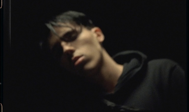 Video Reference: Face, Black, Photograph, Darkness, Nose, Portrait, Head, Chin, Human, Male