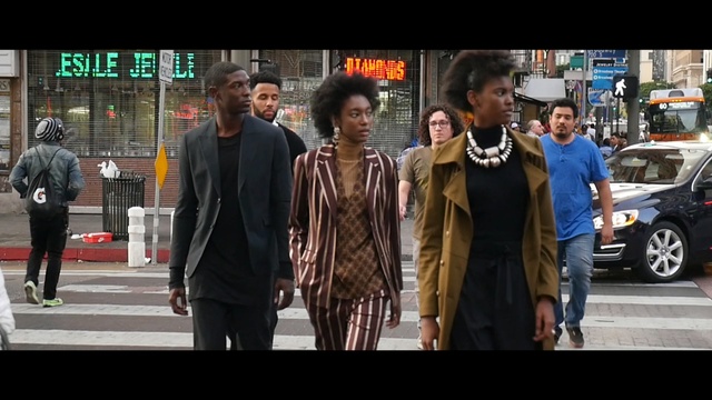 Video Reference: infrastructure, street, road, pedestrian, city, car, event, Person