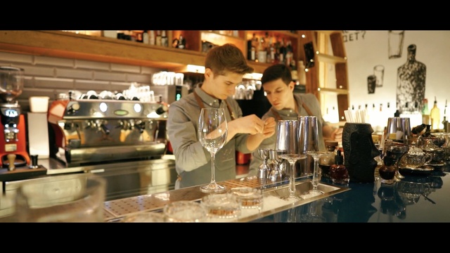 Video Reference: drink, alcoholic beverage, distilled beverage, bar, liqueur, Person