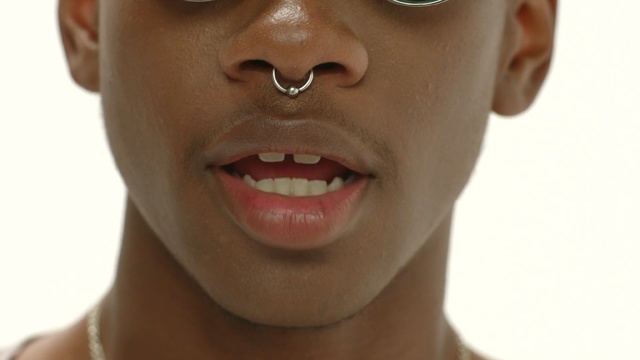 Video Reference: lip, chin, cheek, nose, tooth, eyebrow, close up, jaw, mouth, smile