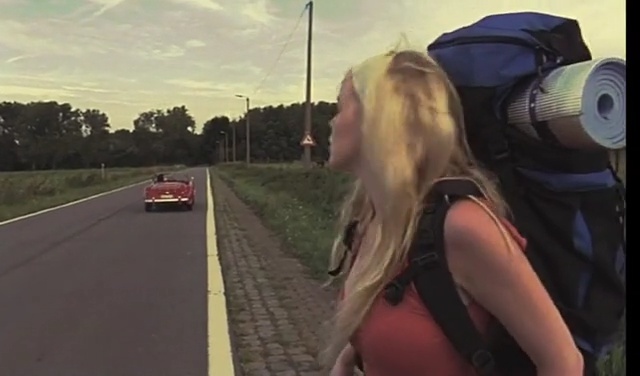 Video Reference: car, road, human hair color, mode of transport, blond, vehicle, girl, lane, asphalt, driving