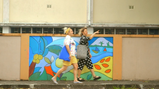 Video Reference: Street art, Wall, Art, Mural, Yellow, Graffiti, Visual arts, Summer, Painting, Vacation, Person