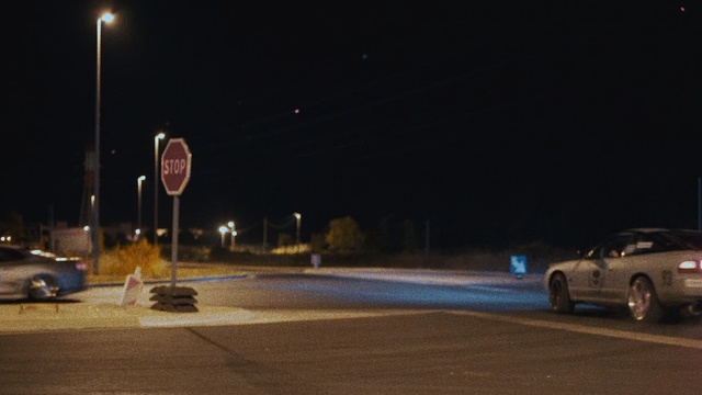 Video Reference: Night, Vehicle, Car, Automotive lighting, Road, Lighting, Performance car, Infrastructure, Street light, Street