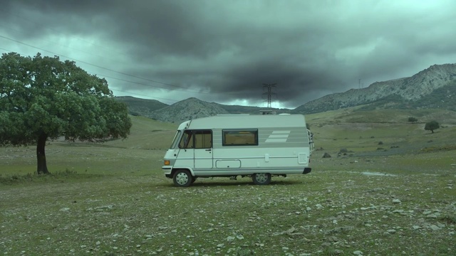 Video Reference: nature, car, sky, ecosystem, cloud, vehicle, mode of transport, motor vehicle, highland, van