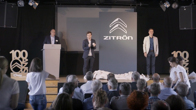 Video Reference: Event, Fashion, Design, Public speaking, Businessperson, Performance, Crowd, Convention, Stage, Stage equipment, Person