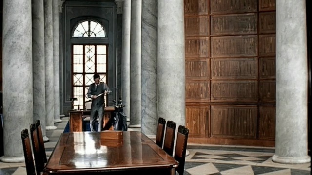 Video Reference: interior design, furniture, window, table, building, chair, Person