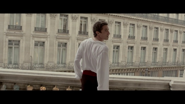 Video Reference: photograph, urban area, snapshot, male, photography, screenshot, sitting, fun, building, window