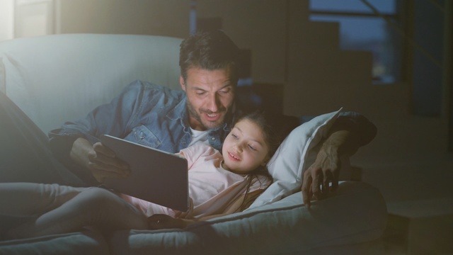 Video Reference: Child, Reading, Comfort, Room, Fun, Bedtime, Electronic device, Couch, Baby, Sitting, Person