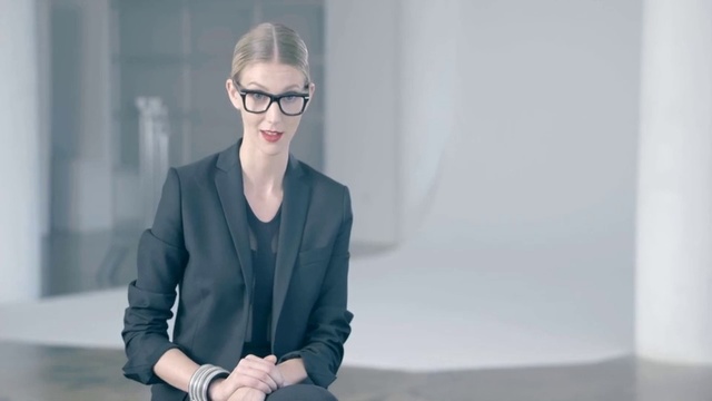 Video Reference: Eyewear, Glasses, Fashion, Sitting, Fashion design, Vision care, Blond, Photography, Outerwear, Street fashion, Person