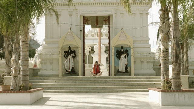 Video Reference: place of worship, tourist attraction, temple, building, facade, Person