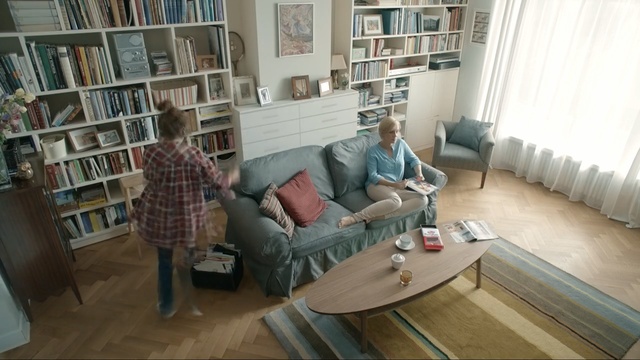 Video Reference: Living room, Furniture, Room, Property, Floor, Interior design, Shelving, Bookcase, Building, Home, Person