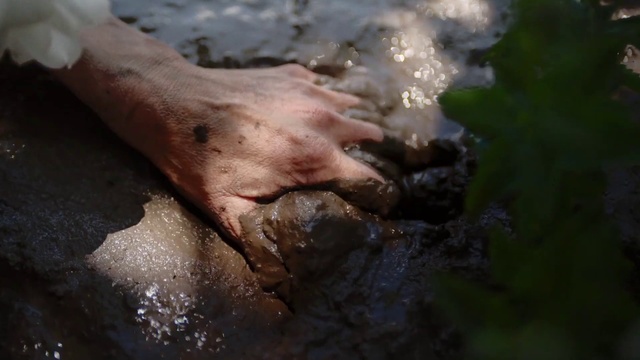 Video Reference: Water, Hand, Soil, Mud, Flesh