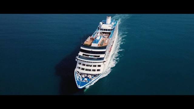 Video Reference: Water transportation, Naval architecture, Vehicle, Cruise ship, Ship, Boat, Passenger ship, Ocean liner, Watercraft, Motor ship, Water, Large, Small, Man, Ocean, Floating, Body, Riding, Monitor, Television, Harbor, Air, Blue, Wave, White, Sea