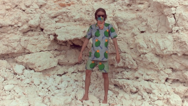 Video Reference: Wall, Fashion, Outerwear, Adaptation, Joint, Fun, Soil, Geological phenomenon, Toy, Plant, Person