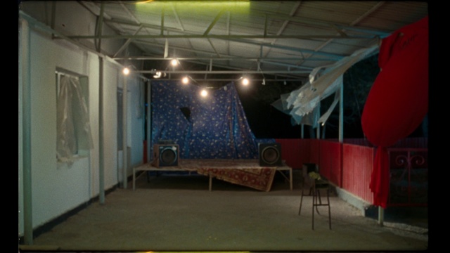 Video Reference: Ceiling, Lighting, Architecture, Wall, Room, Building, Stage, Infrastructure, Interior design, Space