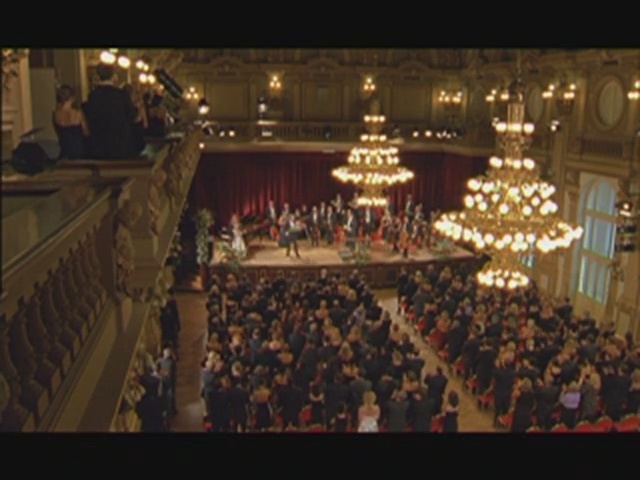 Video Reference: Auditorium, Stage, Theatre, Concert hall, Crowd, Audience, Performing arts center, Opera house, Musical instrument accessory, Event, Person