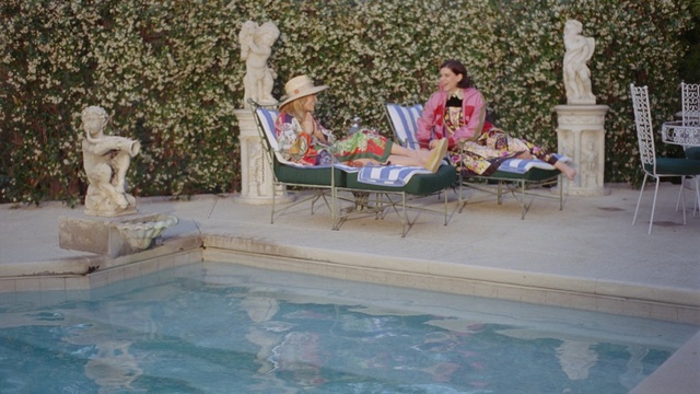 Video Reference: swimming pool, property, leisure, water feature, water, outdoor structure, recreation, vacation, backyard, resort, Person