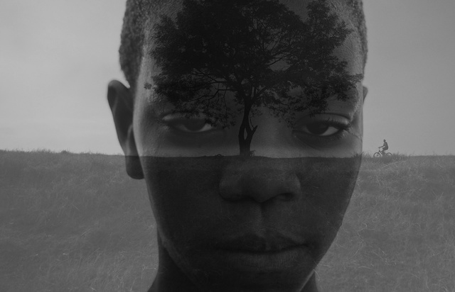 Video Reference: Face, Hair, Black, Head, Forehead, Nose, Black-and-white, Eyebrow, Skin, Monochrome