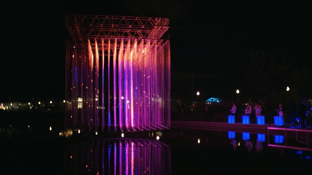 Video Reference: reflection, night, light, purple, lighting, structure, architecture, darkness, water, tourist attraction