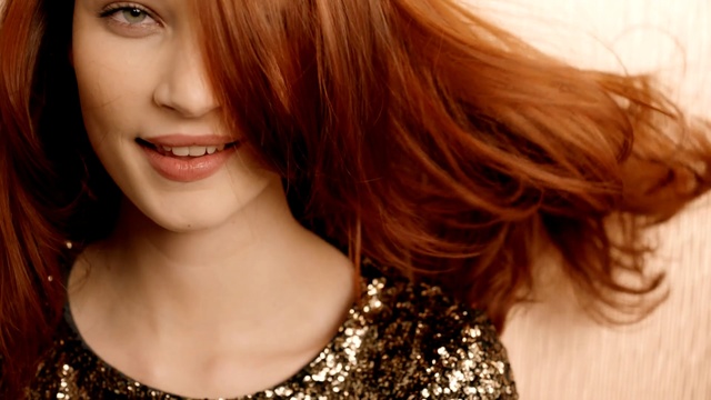 Video Reference: Hair, Face, Hairstyle, Lip, Hair coloring, Red hair, Brown hair, Eyebrow, Layered hair, Blond, Person