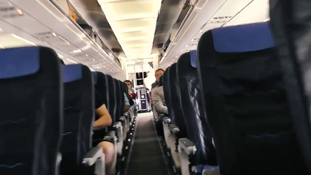 Video Reference: Air travel, Airline, Transport, Vehicle, Aircraft cabin, Passenger, Aisle, Aerospace engineering, Airplane