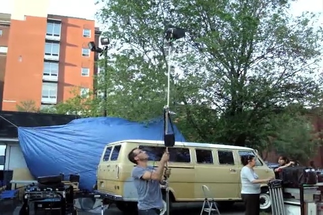 Video Reference: car, vehicle, transport, mode of transport, van, luxury vehicle, tree, automotive exterior, public transport, plant, Person