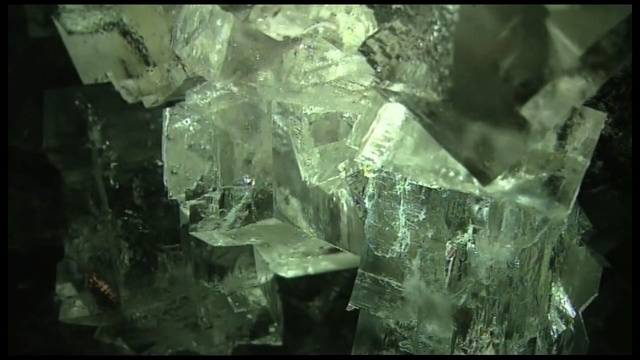 Video Reference: Green, Crystal, Mineral, Rock, Organism, Water, Geology, Formation, Quartz, Space, Person