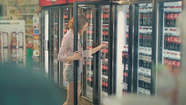 Video Reference: Textile, Display case, Building, Retail, Window, Door, Display window, Glass, Collection, Person