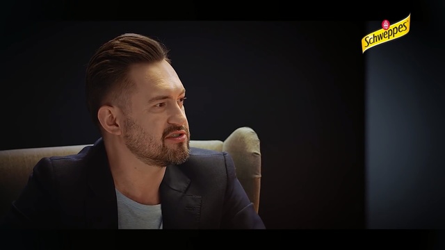 Video Reference: Chin, Cheek, Facial hair, Nose, Forehead, Arm, Gentleman, Neck, Ear, Beard, Person, Man, Indoor, Looking, Laptop, Sitting, Front, Computer, Screen, Suit, Dark, Using, Table, Wearing, Holding, Glasses, Shirt, Standing, Young, Food, White, Phone, Screenshot, Human face, Text, Clothing, Portrait, Human beard