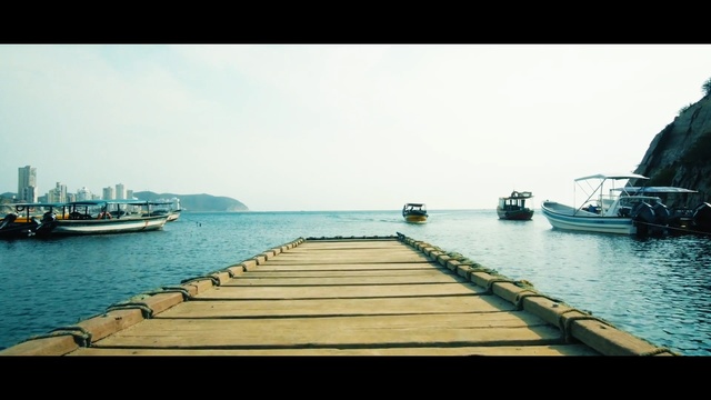 Video Reference: sea, waterway, water, body of water, water transportation, sky, horizon, dock, calm, pier