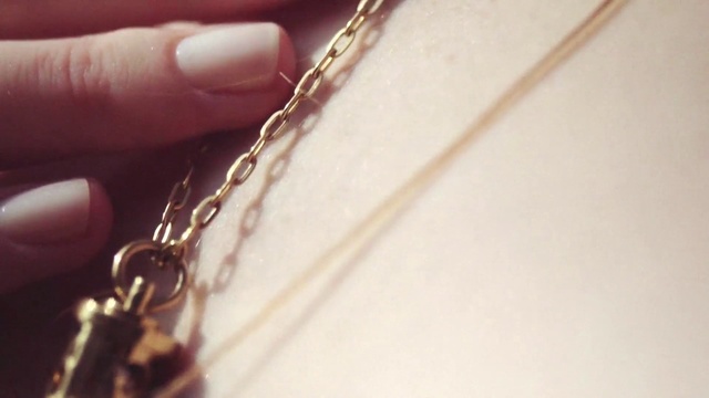 Video Reference: Chain, Hand, Finger, Jewellery, Material property, Necklace, Fashion accessory, Font, Metal