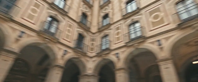 Video Reference: Classical architecture, Building, Architecture, Arch, Landmark, Medieval architecture, Arcade, Historic site, Facade, Basilica, Person