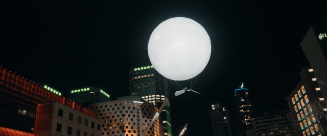 Video Reference: Moon, City, Night, Sky, Metropolitan area, Daytime, Human settlement, Light, Metropolis, Midnight