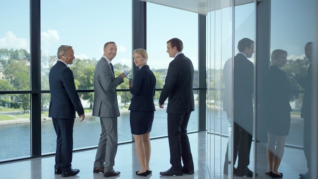 Video Reference: suit, standing, ceremony, event, businessperson, formal wear, business, energy, wedding, white collar worker, Person