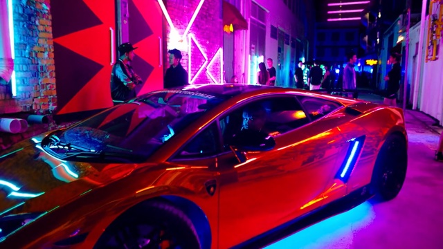Video Reference: Land vehicle, Supercar, Vehicle, Automotive design, Car, Lamborghini aventador, Lamborghini, Sports car, Neon, Automotive lighting, Person, Female