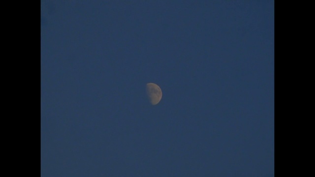 Video Reference: Moon, Sky, Nature, Blue, Daytime, Atmosphere, Astronomical object, Moonlight, Atmospheric phenomenon, Celestial event