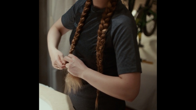 Video Reference: shoulder, hairstyle, fashion accessory, girl, outerwear, fashion, long hair, arm, scarf, neck