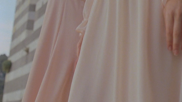 Video Reference: Pink, Peach, Clothing, Dress, Textile, Silk, Beige, Strapless dress, Gown, Curtain