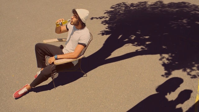 Video Reference: Sand, Shadow, Landscape, Footwear, Leg, Headgear, Tree, Photography, Knee, Sitting
