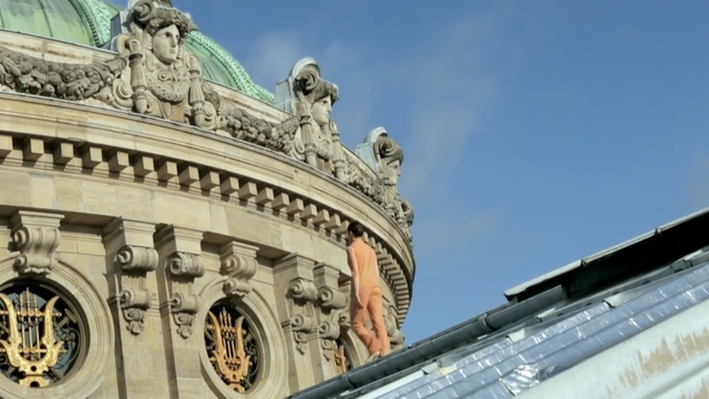 Video Reference: landmark, building, historic site, sky, monument, classical architecture, metropolis, tourist attraction, tourism, facade, Person