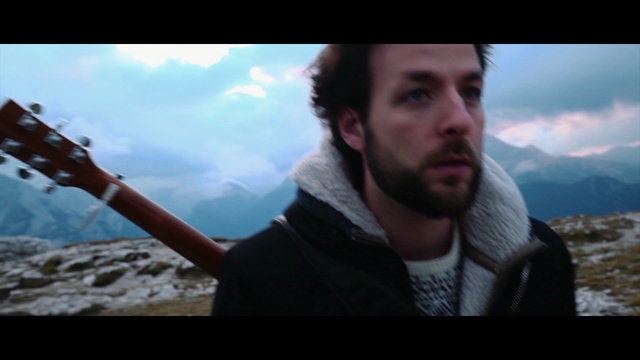 Video Reference: sky, screenshot, mountain, cloud, facial hair, adventure, Person