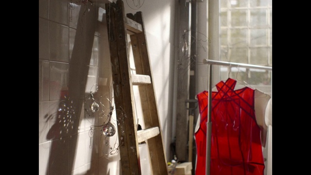 Video Reference: Red, Curtain, Interior design, Room, Dress, Textile, Window, Outerwear