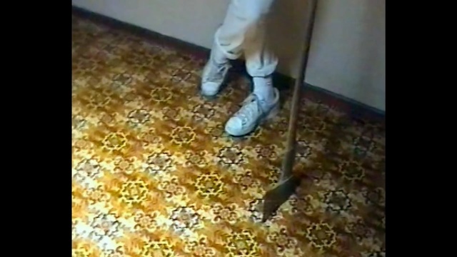 Video Reference: Floor, Footwear, Flooring, Shoe, Tile, Yellow, Leg, Boot, Hardwood, Wood