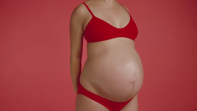 Video Reference: Undergarment, Brassiere, Lingerie, Clothing, Red, Undergarment, Stomach, Bikini, Swimsuit top, Briefs