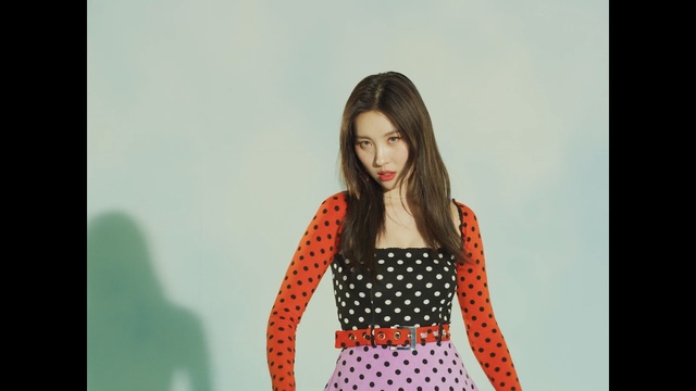Video Reference: Hair, Photograph, Clothing, Lady, Fashion model, Photo shoot, Beauty, Shoulder, Orange, Polka dot, Person
