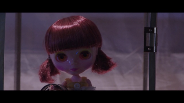 Video Reference: doll, human hair color, nose, purple, eye, mouth, screenshot, girl, darkness, brown hair