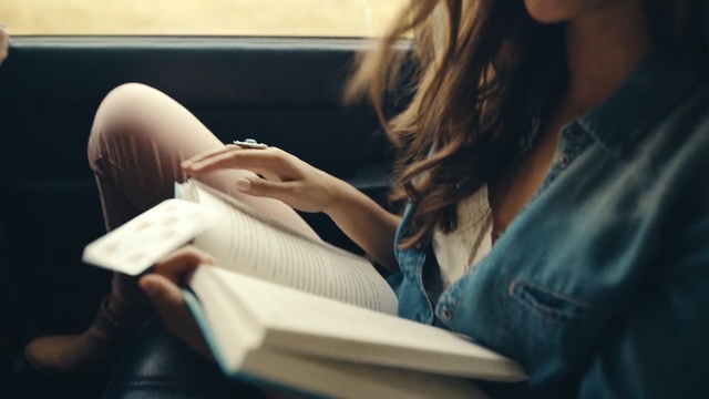 Video Reference: sitting, girl, hand, reading, Person